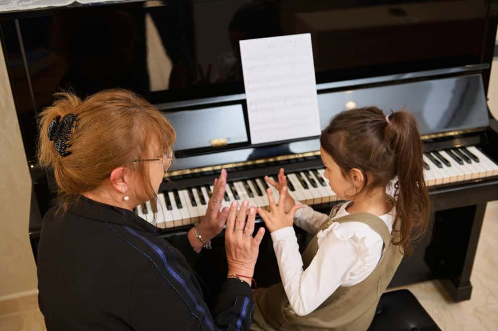 Featured image for The Ultimate Guide to Piano Lesson at Home for Kids: Benefits, Methods, and Tips