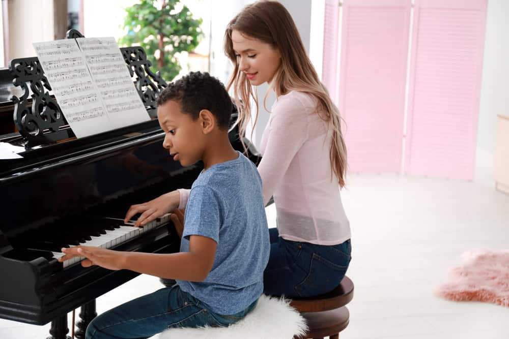 Featured image for The Ultimate Guide to Piano Lessons at Home for Kids